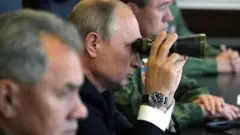 Путін