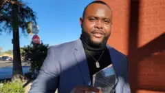 JOHN NAHIMANA
