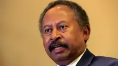 Sudan military reinstates prime minister Abdalla Hamdok but protests continue