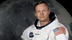 the "Apollo 11" lunar landing mission commander Neil A. Armstrong, posing in his space suit
