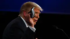 Trump holding mask