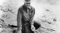 Roy Chapman Andrews Holds Dinosaur Eggs