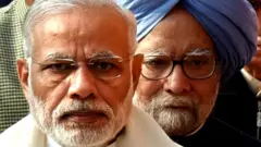 नरेंद्र मोदी आणि मनमोहन सिंग