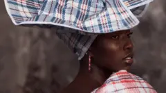 Model in Ghana Must Go fabrics