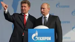 путін