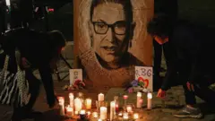 The late US Supreme Court Justice Ruth Bader Ginsburg is mourned during a vigil in Monument Square in Portland, Maine, US, September 20, 2020