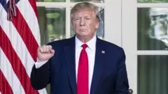 Donald Trump gestures during a ceremony marking the establishment of the US Space Command at the White House on 29 August 2019