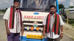 Jayendran Perumal ( left) and Chinnathambi Sellaiya in traditional shawl and shirt presented to them