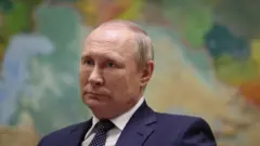 Путін
