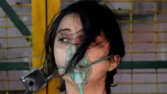 ஆக்சிஜன் உதவி பெற்ற நோயாளி