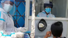 कोभिड परीक्षण