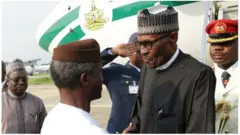 Buhari is greete by Osinbajo