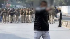 ફાયરિંગની તસવીર