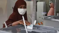 ድምጽ የሚሰጡ ሴት
