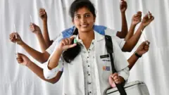 A nurse holding a vaccination vile while others stand behind to form the pose of the Goddess Durga