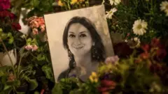 Daphne Caruana Galizia Maltalı qətlə yetirilmiş araşdırmaçı jurnalist