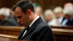 outh African Paralympic athlete Oscar Pistorius sit on the chair at the North Gauteng High Court to attend summary judgement on his trial on July 6, 2016