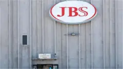 JBS logo at plant in Greeley, Colorado, April 2020 file picture