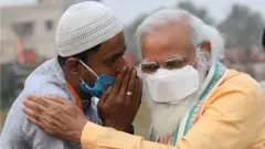 મોદી અને મુસ્લિમ પુરુષ