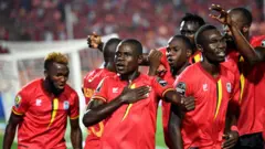Patrick Kaddu célèbre le but de l'Ouganda à l'ouverture de la Coupe d'Afrique des Nations 2019