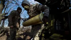 військові