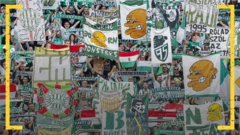 Ferencvaros fans display banners supporting their club