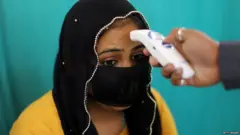महिलेची तपासणी