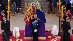The Queen's eight grandchildren, led by Princes William and Harry, stood vigil at her coffin at Westminster Hall