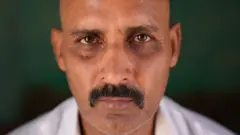 Retrato de Niranaram Chetanram Chaudhary