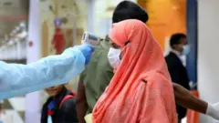 করোনাভাইরাসের পরীক্ষা নিয়ে বিভ্রান্তিতে বিদেশগামী যাত্রীরা