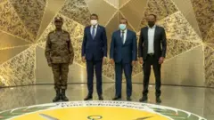 ፊልድ ማርሻል ብርሃኑ ጁላ፣ ሌፍተናንት ጄነራል ሞሐመድ ሐምዳን ዳጋሎ፣ ጠቅላይ ሚኒስትር ዐቢይ አህመድ እና የመከላከያ ሚኒስቴር ሚኒስትር ዶ/ር አብርሃም በላይ
