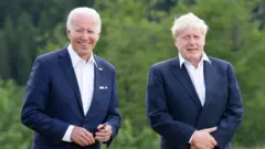 بوريس جونسون وجو بايدن