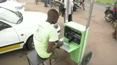 A man charging his phone
