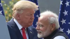 નરેન્દ્ર મોદી અને ડોનાલ્ડ ટ્ર્મ્પ