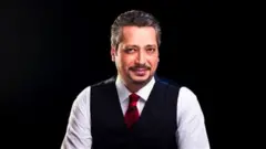 الإعلامي تامر أمين