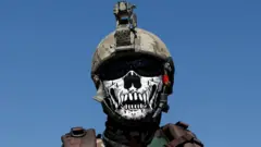 An Afghan Special Forces member attends his graduation ceremony in Kabul, Afghanistan, 17 June