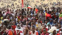 Refugees from the Tigray region at a refugee camp in Sudan