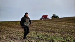 Farmer in flack jacket