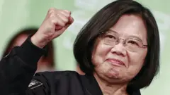 Taiwan's President Tsai Ing-wen celebrates in Taipei on January 11, 2020