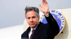 Anthony Blinken stepping off a plan