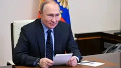 Путин