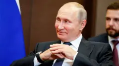 Путін