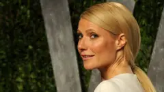 Gwyneth Paltrow arrives at the 2012 Vanity Fair Oscar Party wearing a diamond bracelet designed by Anna Hu