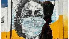 መሸፈኒ ኣፍን ኣፍንጫን ንምጥቃም ዝተሰርሐ መወዓውዒ