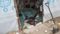 Pikin for camp for people wey run from Boko Haram for Maiduguri, Nigeria