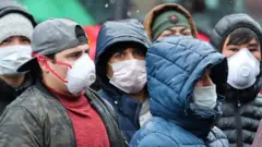 Орусиядагы карантинден улам мигранттар жумушунан айрылды