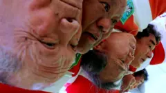 Members of Tokyo's Fuwaku Rugby Club train outdoors