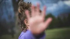 A stock image of someone who doesn't wish to be photographed