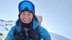 Nasmejana žena na Himalajima