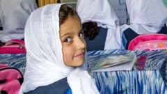 Afghan boys and girls attend mixed classes at the Ariana Kabul Private School in September 2019, in north Kabul, Afghanistan